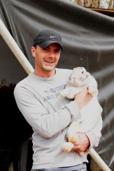 Ryan Cox with a Flemish Giant Rabbit